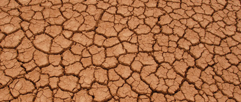 Cracked ground because of drought of a dried up lake / ©: Michel Gunther / WWF-Canon / ©: Michel Gunther / WWF-Canon